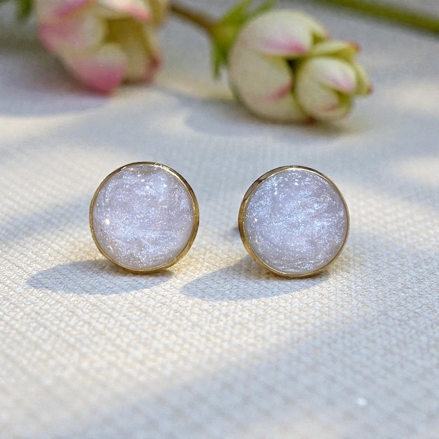 Puces d’oreilles - blanches